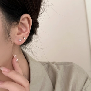 Sparkling cubic zirconia ball stud earrings in silver, elegant minimalist design for women