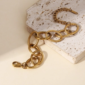 Bracelet gourmette à maillons épais en acier inoxydable plaqué or 18 carats et fermoir
