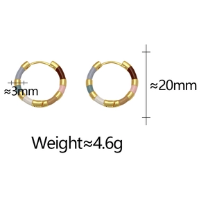 Close-up of multicolor enamel huggie hoop earrings with gold plated accents