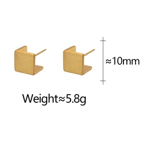 Detail view of 10mm gold-plated cubic stud earrings with a brushed metallic texture