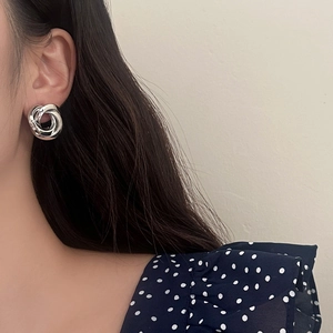 Polished silver intertwined knot earrings for women with minimalist multi-loop design
