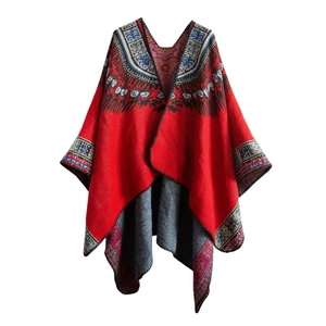 Detail of red jacquard shawl featuring intricate bohemian geometric knitting patterns