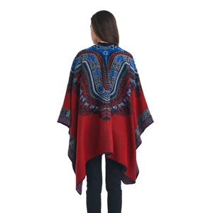 Women's red jacquard knit poncho shawl with blue ethnic patterns in a back view display