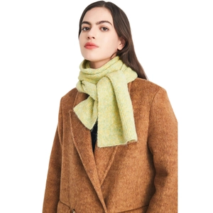 Soft knit wool scarf in pale green and yellow mix for winter warmth and cozy comfort