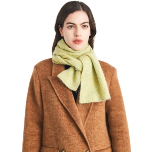 Soft light green wool knit scarf for men and women worn with a brown wool coat