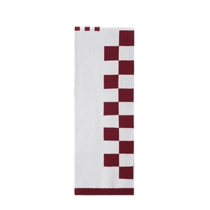 Close-up of red and white checkered jacquard knit scarf with ribbed edge details