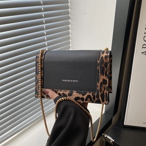 Fashion leopard print flap bag with gold chain strap and stylish lettering print