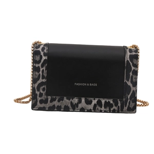 Fashion square bag with leopard print trim and gold chain strap on white background