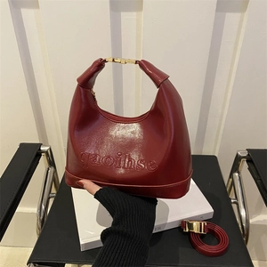 Stylish dark red hobo handbag with gold buckle and embossed logo for women