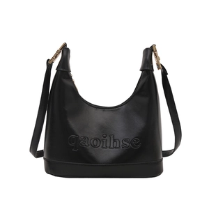 Fashionable black leather hobo bag with gold hardware and logo for stylish women