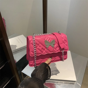 Rose pink butterfly chain crossbody bag with quilted texture and fashion embossing
