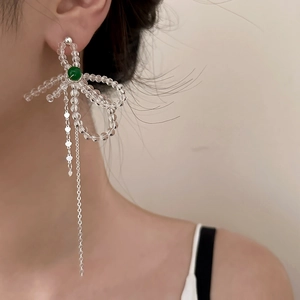 Handmade transparent crystal bow earrings with green bead and silver tassel fringe