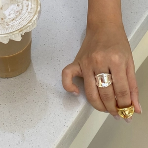 Minimalist wide irregular metal rings in gold and silver finish for a modern fashion look