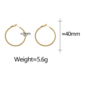 Detailed view of 40mm 18K gold plated hoop earrings with textured beaded surface
