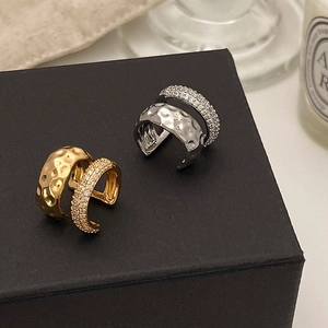 Elegant gold and silver double-layered ear cuffs with sparkling zircons and hammered metal