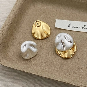 Irregular minimalist gold plated earrings with detachable pearl textured elements