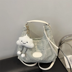 Large capacity blue canvas tote bag with geometric texture and plush cloud keychain