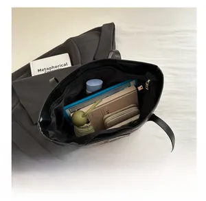 Top view of large capacity leopard print tote bag filled with a tablet and accessories