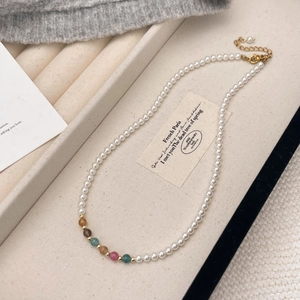 Elegant handmade pearl necklace with colorful natural stones and gold lobster clasp