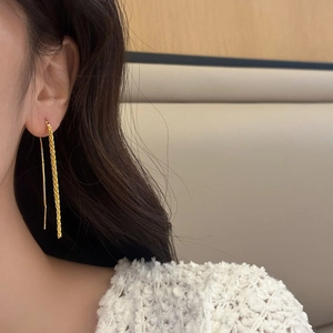 Elegant gold long tassel chain earrings for women featuring sparkling textured metallic finish
