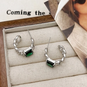 Elegant silver twisted chain hoop earrings with rectangle green zircon in a wooden box