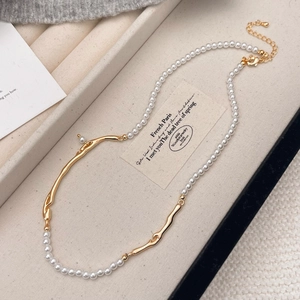 French vintage necklace with white pearls and irregular wavy gold metal branch links