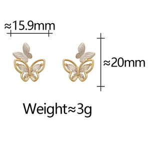 Detailed view of dual-tone butterfly earrings with sparkling cubic zirconia and frosted texture