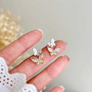 Elegant twin butterfly earrings with sparkling cubic zirconia and gold plating finish
