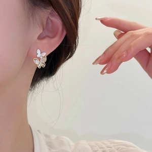 Elegant layered butterfly earrings with white shell and sparkling cubic zirconia stones