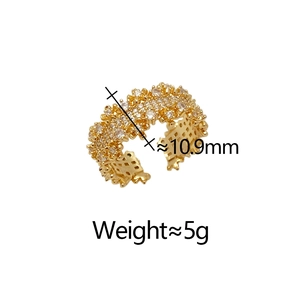 Detailed view of gold wide ring with micro-pave cubic zirconia and 10.9mm inner diameter