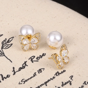 Boucles d'oreilles papillon en perles avec zircons et finition dorée vintage française