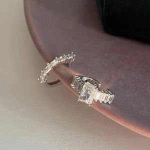 Sparkling zircon gold-plated ear cuffs and ring set with elegant emerald cut details