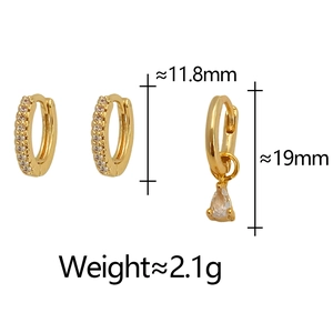 Detail showing dimensions of gold huggie earrings with a pear-shaped zircon drop pendant