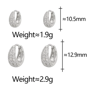 Detailed size comparison of small and large silver hoop earrings with pavé cubic zirconia