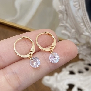 French vintage gold plated hoop earrings featuring sparkling round cubic zirconia stones