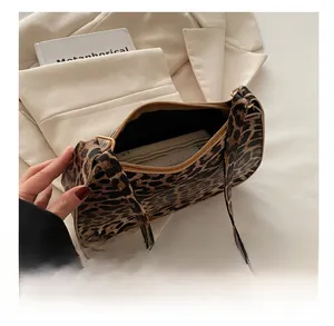 Overhead view showing the spacious interior capacity of this leopard print shoulder bag
