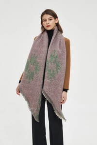 Detail of thick jacquard scarf showing purple knit texture and green geometric patterns