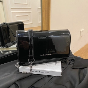 Fashionable black patent leather crossbody chain bag with flap cover and metal strap