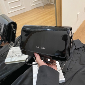 Fashionable black patent leather crossbody square bag with silver chain strap for women