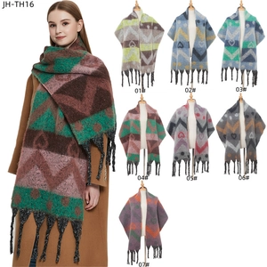 Thick knit winter scarf with heart jacquard and fringe available in seven contrast colors