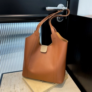 Caramel leather large tote bag for women with long shoulder straps and metal buckle