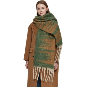 Thick gradient green and brown striped scarf with chunky tassels and plush mohair texture