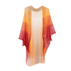 Detail of summer mesh knit shawl showing gradient color stripes and fringed tassels