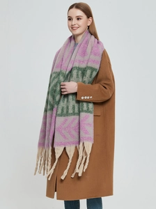 Detail of chunky faux mohair scarf featuring geometric leaf jacquard and long fringes