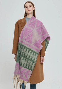Close-up of thick knitted scarf with purple and green leaf pattern and long tassels