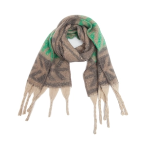 Close-up of thick grey and green jacquard leaf pattern knit scarf with long braided tassels