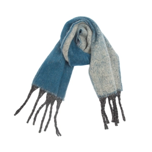 Close-up of blue and gray chunky knit scarf with long black decorative tassels