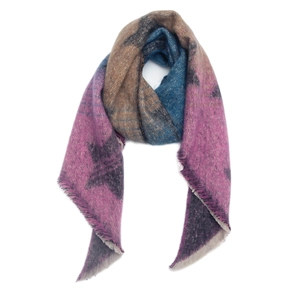 Detail of a thick striped shawl with colorful patchwork, fringe edges and star patterns