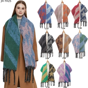 Thick knit star pattern scarf with tassels in various color block styles for winter