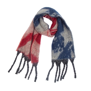 Detail of red white and blue star pattern knit scarf with fringe tassel hem